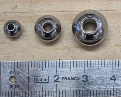 Bille Bi inox avec trou traversant pour Joint